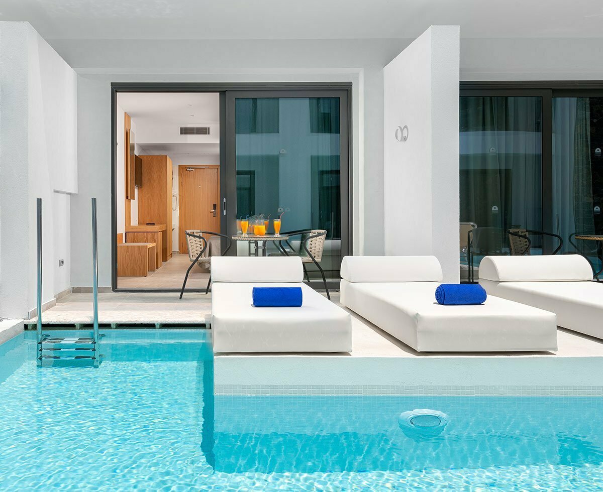 Lindos Royal Resort Car Rental | Cario Rhodes 2 Rooms and Mediterranean architecture at Lindos Royal Resort in Vlycha