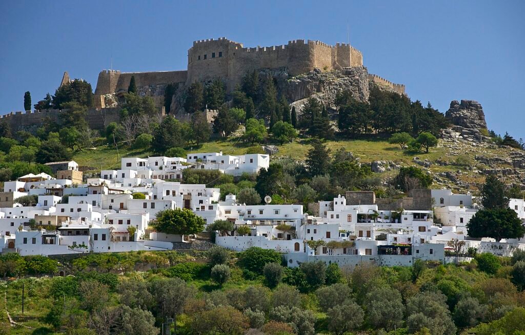 Lindos village and Acropolis above the whitewashed houses