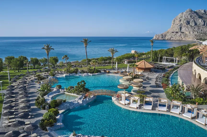 Aerial view of the pools, sun loungers and sea at Atlantica Imperial Resort in Kolymbia, Rhodes