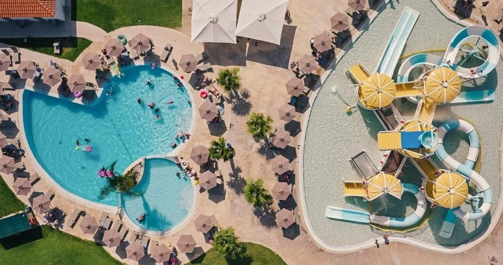 Aerial view of the pools and water slides at Blue Sea Island resort in Kolymbia, Rhodes