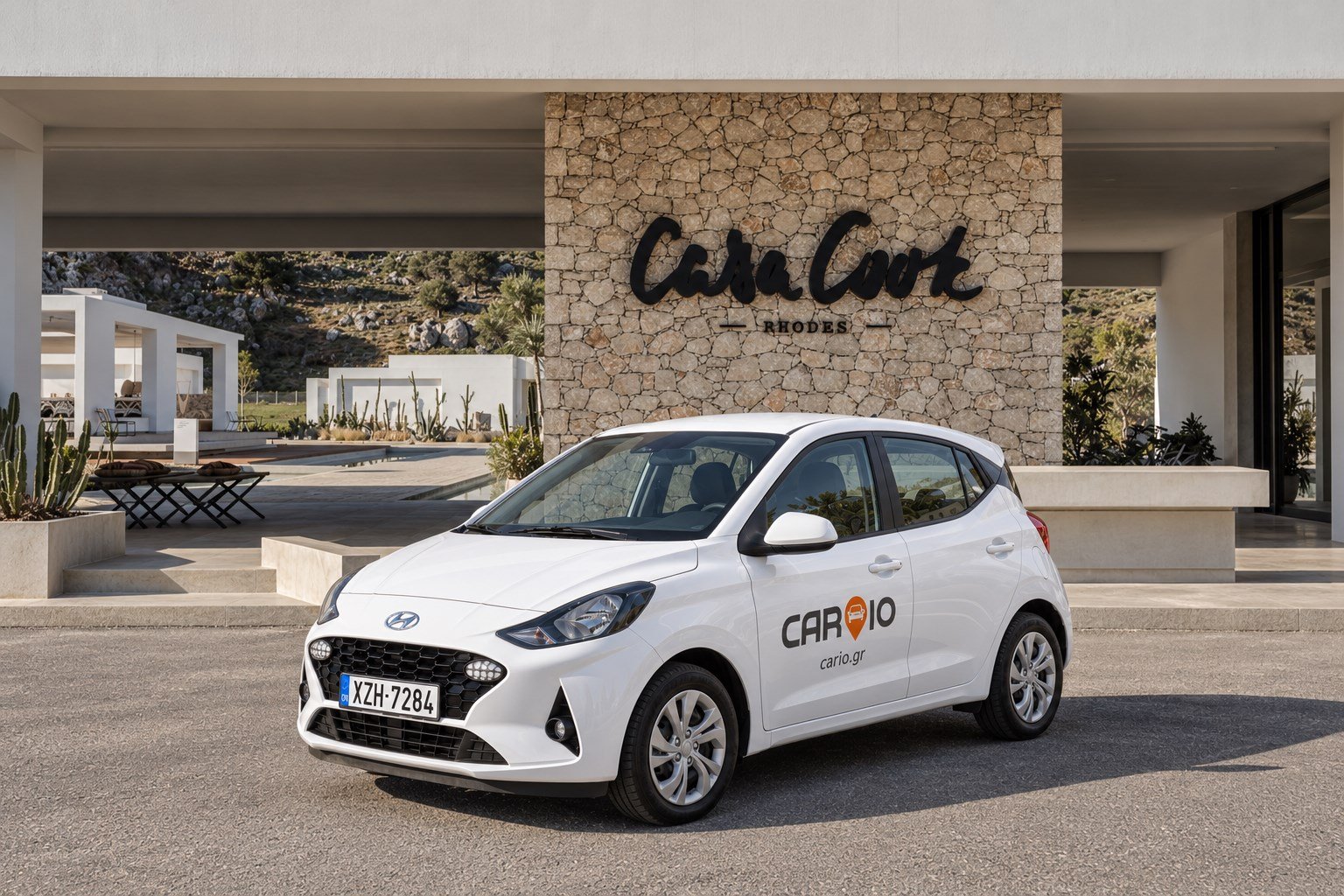 White CARIO rental car outside Casa Cook Rhodes, Rhodes