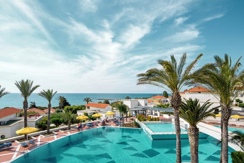 Swimming pool and resort buildings at Mitsis Rodos Maris in Kiotari, Rhodes