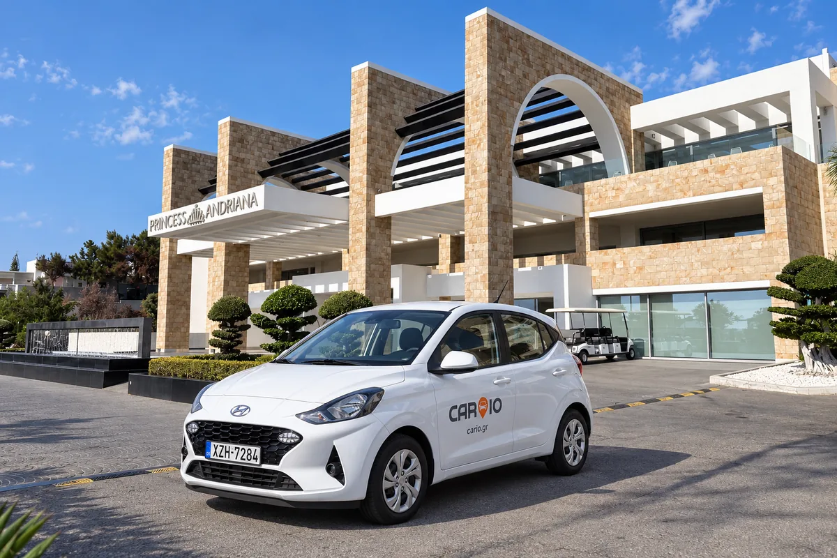 CARIO Hyundai i10 rental car at the entrance of Princess Andriana Resort & Spa in Kiotari, Rhodes