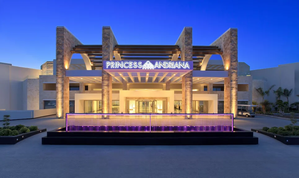 Main entrance of Princess Andriana Resort & Spa in Kiotari, Rhodes, lit up in the evening
